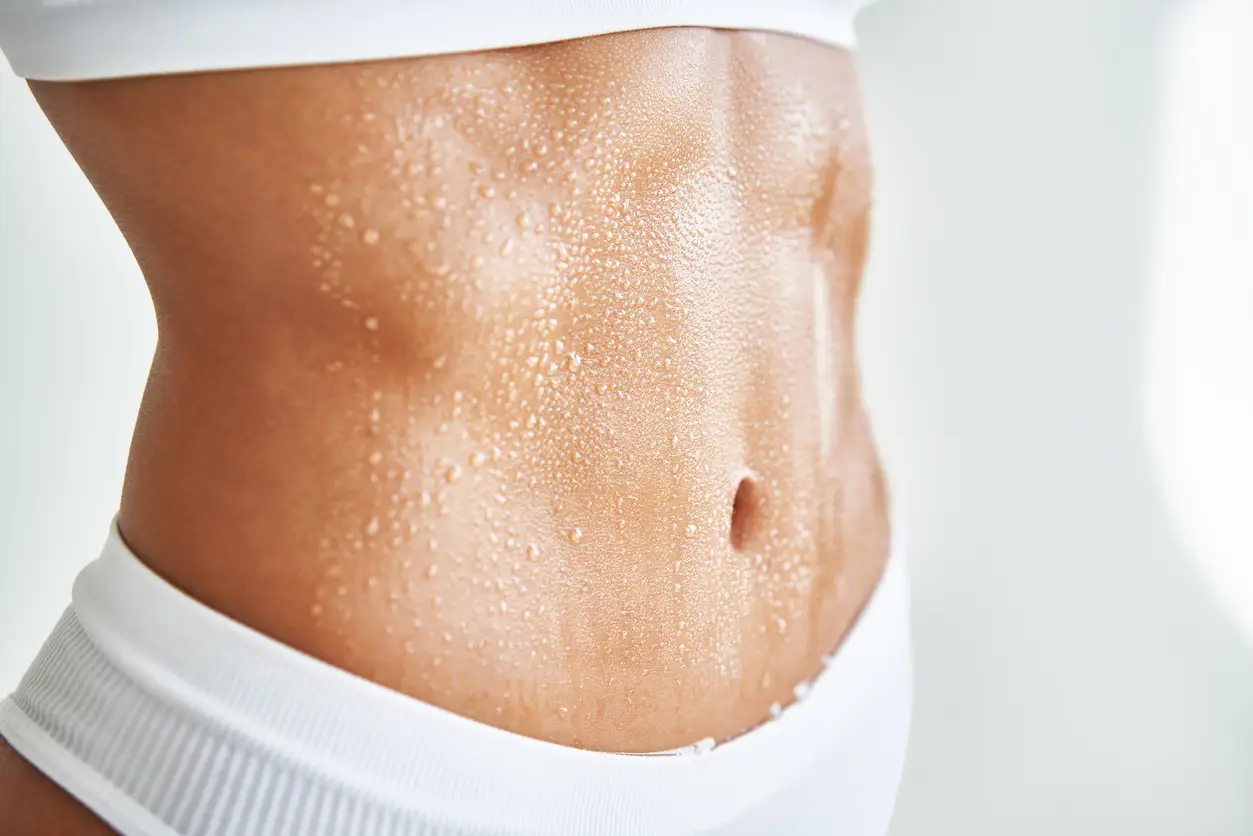 Beads of sweat on skin after a HOCATT session